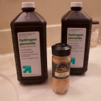 Ingredients for a detox bath: hydrogen peroxide and ginger.